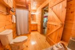 Main Level Bathroom Features a Stand Up Shower and Jetted Tub